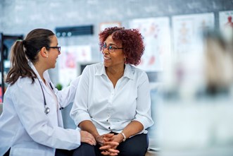 patient and doctor talking