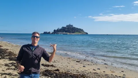 Michael enjoying time at the beach