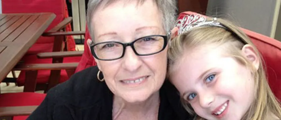 Lynn and her grand-daughter smiling at the camera.