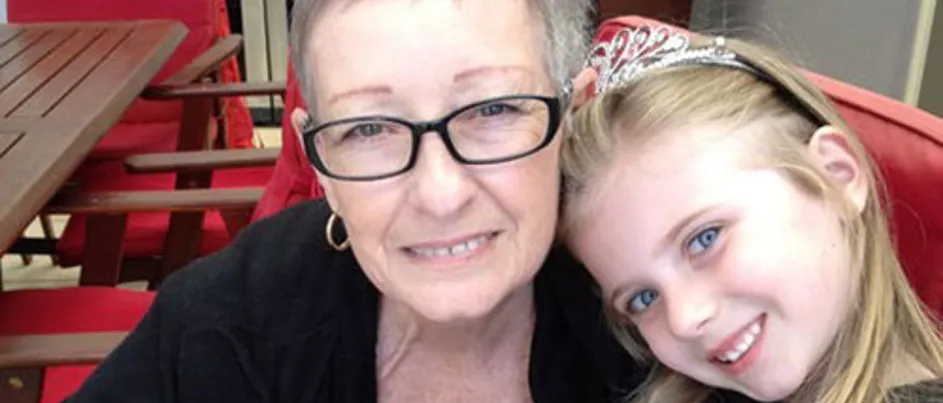 Lynn and her grand-daughter smiling at the camera.