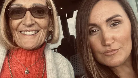 Stephanie and her daughter Sara, taking their last selfie together.