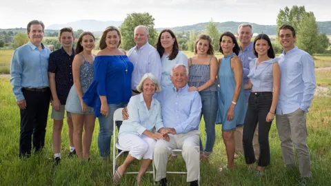 Kelly and Kathy with their family