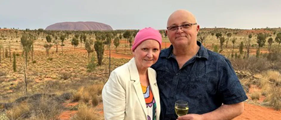 Suzanne and her husband at Uluru.