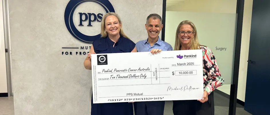 Pankind receiving a cheque from PPS mutual