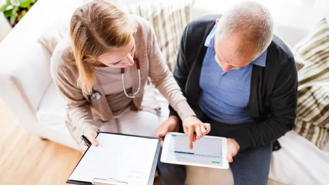 pancreatic cancer patient looking at clinical trial options with his doctor oncologist on an ipad