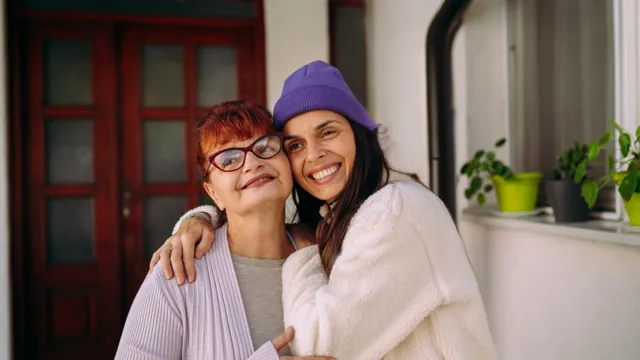 A mother and her daughter embracing