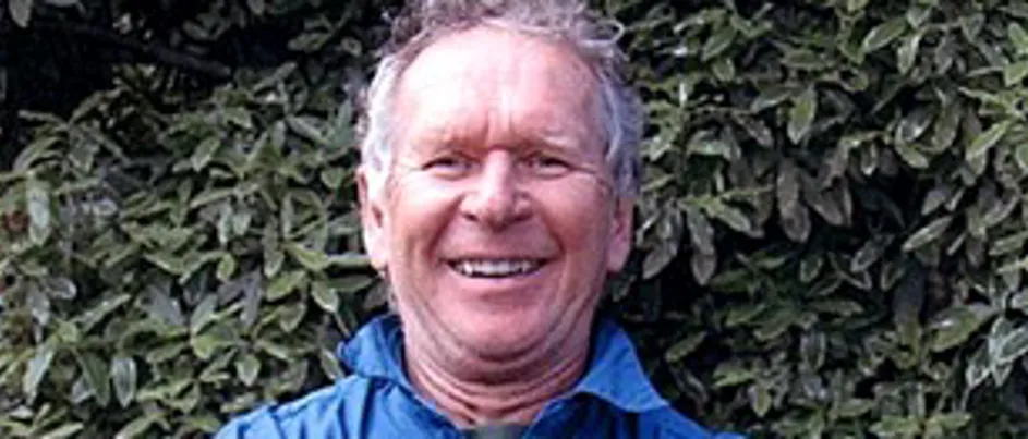 John holding a freshly caught fish.